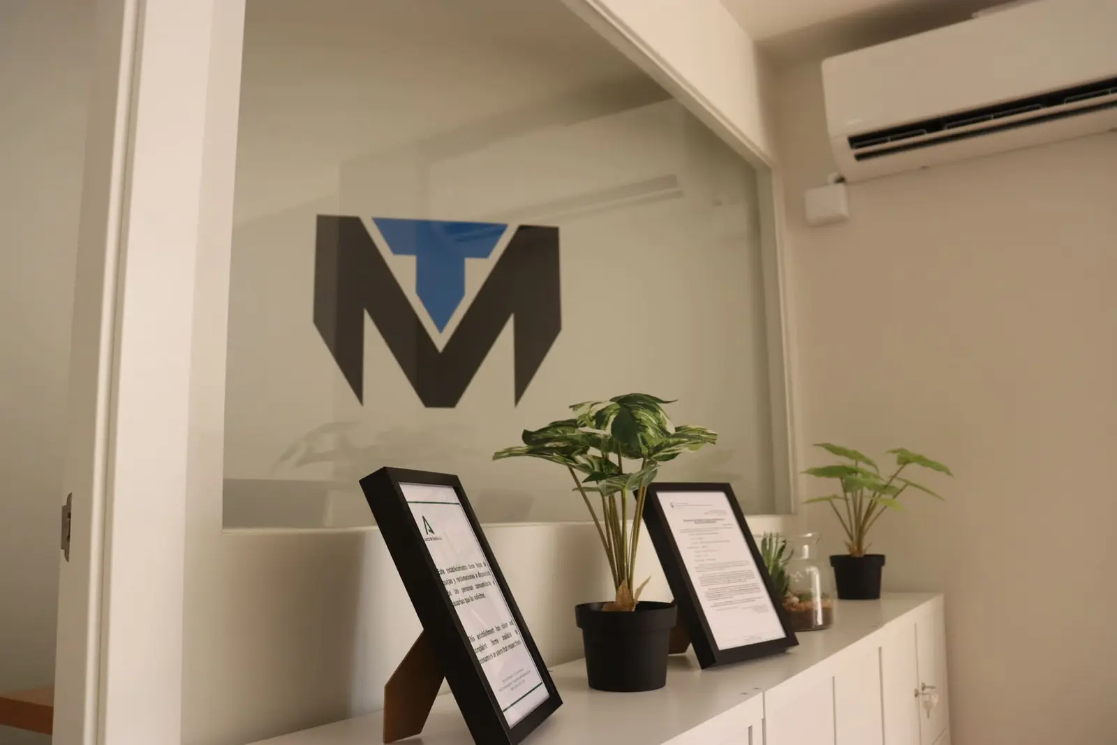 Office entrance with the TuManag3r logo
