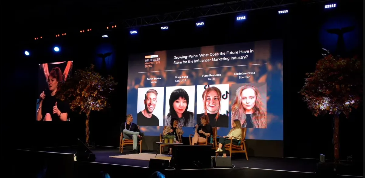 Panel discussion at the Influencer Marketing Show, with speakers on stage