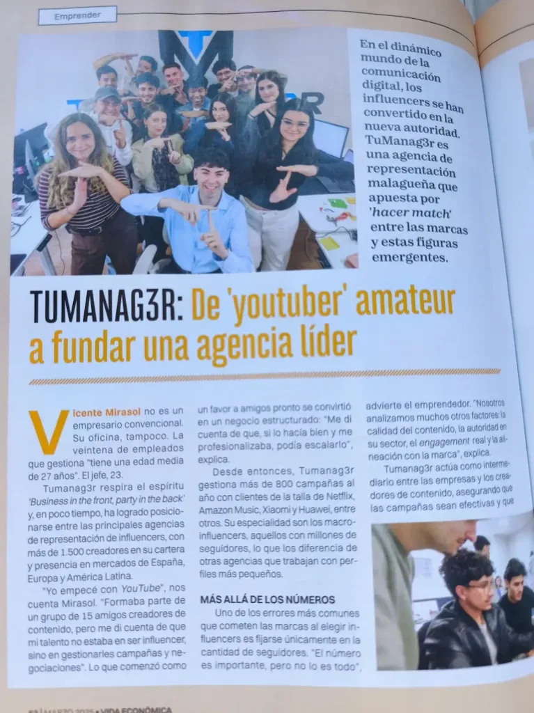 Vida Económica page with a team photo and text about the agency